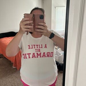 White T-Shirt with Pink Text